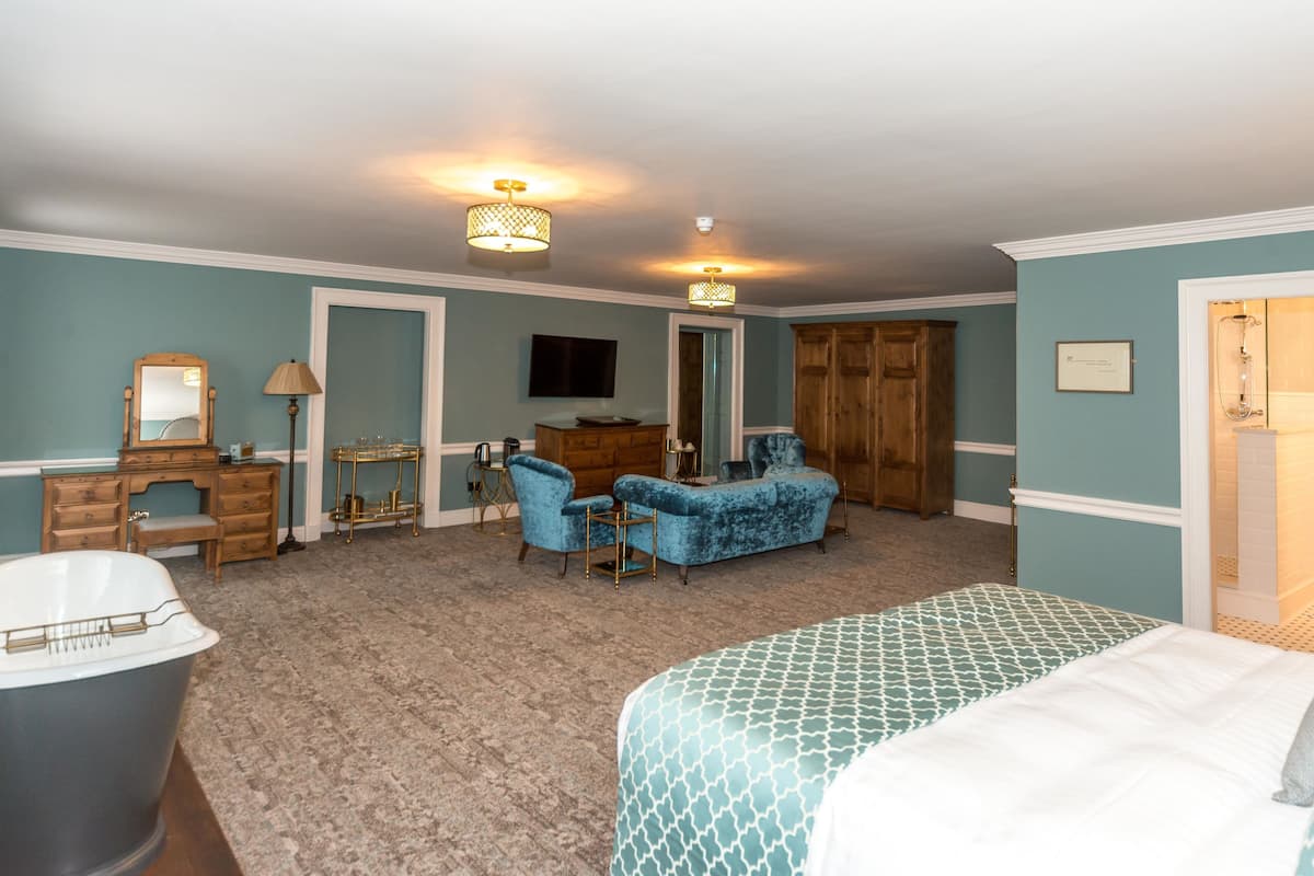 family suite | premium bedding, desk, laptop workspace, blackout curtains