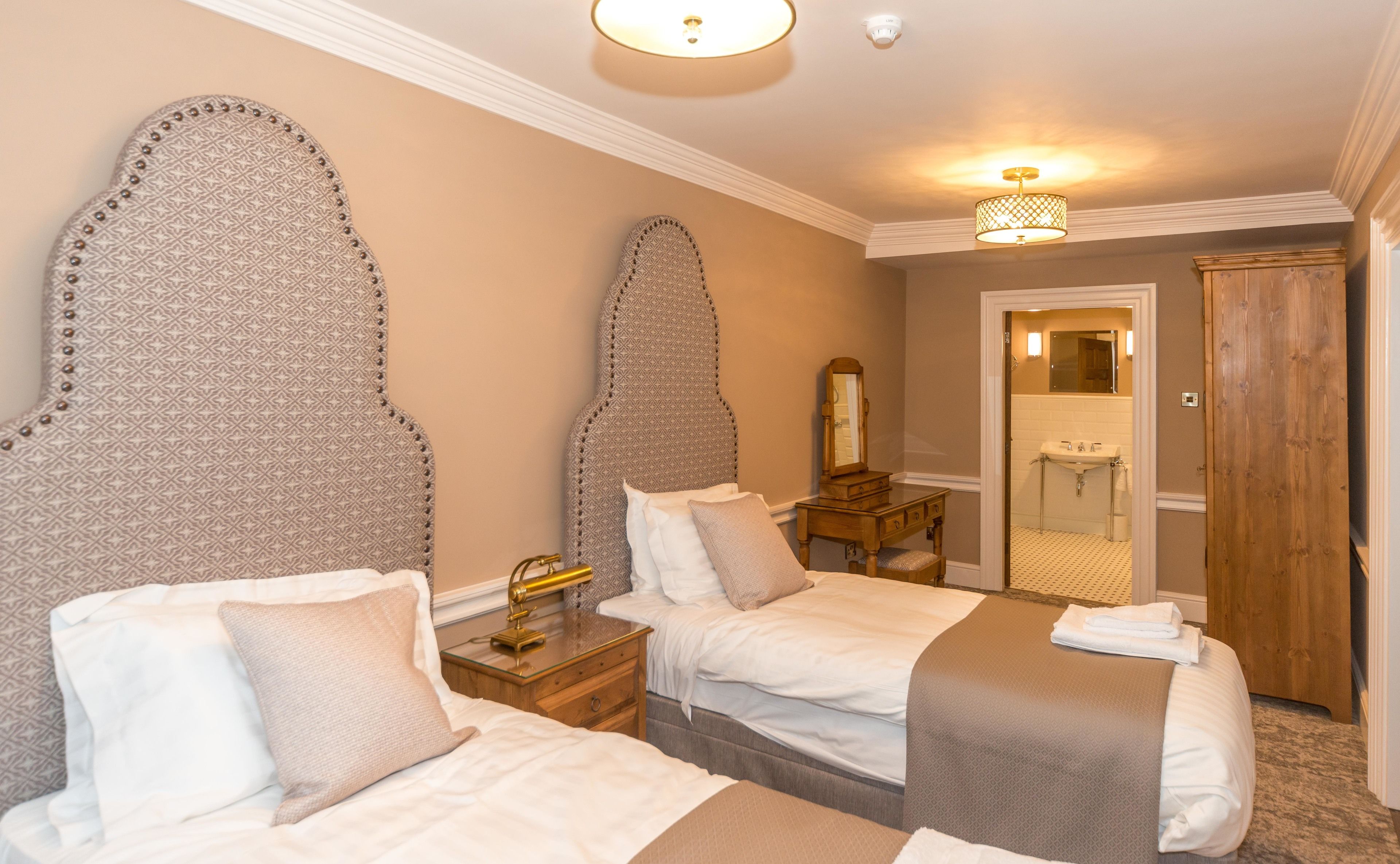 family suite | premium bedding, desk, laptop workspace, blackout curtains