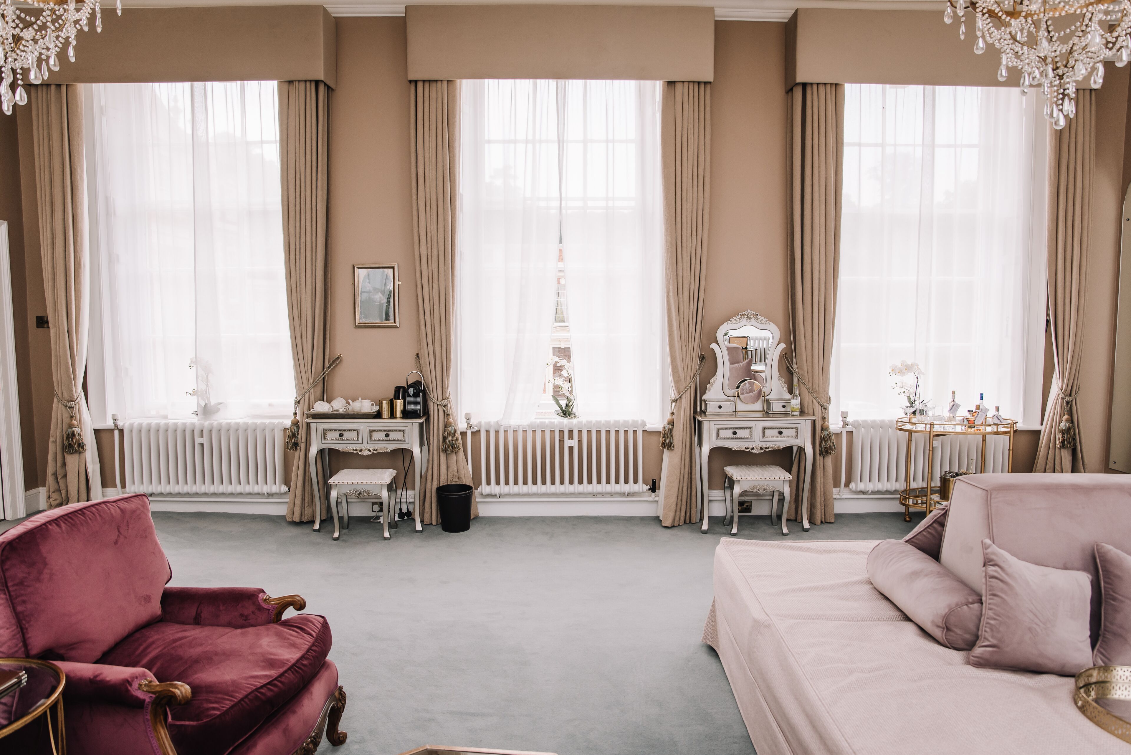 empress suite | premium bedding, desk, laptop workspace, blackout curtains