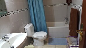 Combined shower/tub, hair dryer, towels, toilet paper