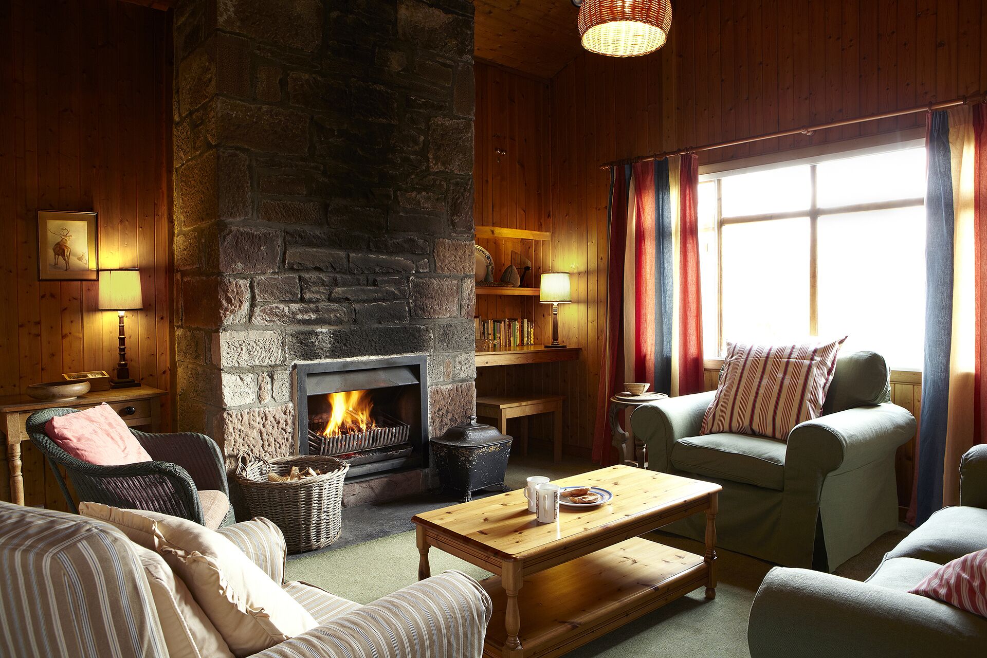 Log Cabin Sitting room with open fire
