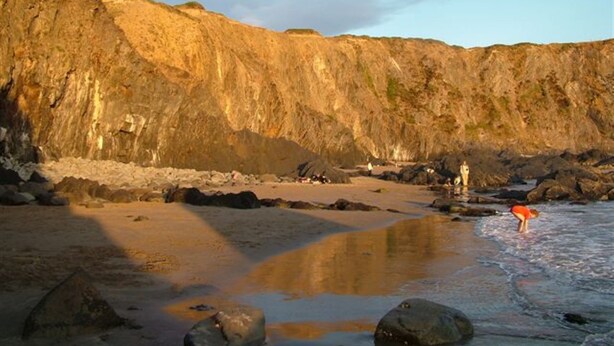A rocky beach with a cliff in the background. - Remote Peaceful Cottage. Great for families. Panoramic Views & Skies. Fresh Air. (St. Nicholas)