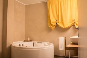 Shower, jetted tub, hair dryer, bidet