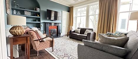 Smart TV, fireplace, DVD player, books