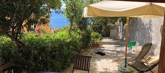 Apartment with exclusive garden and seaview in Pomonte, 50 meters from the sea