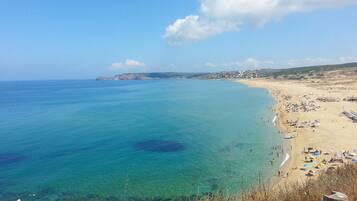 Una spiaggia nelle vicinanze, teli da spiaggia