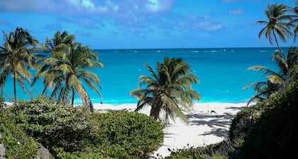 Beautiful 2-Bedroom Apartment right on the beach in this tranquil little bay