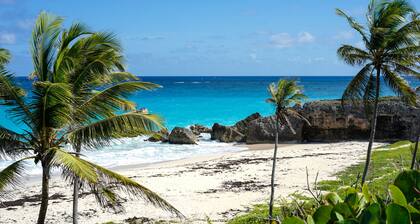 Beautiful 2-Bedroom Apartment right on the beach in this tranquil little bay