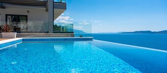 VILLA HRID Luxury beachfront villa, Jacuzzi, heated infinity pool with massage
