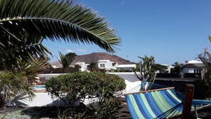 Property grounds - Tranquil setting, sea view, heated pool & Hot Tub, sub-tropical garden. (Playa Blanca)
