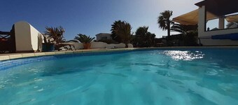 Tranquil setting, sea view, heated pool & Hot Tub, sub-tropical garden.