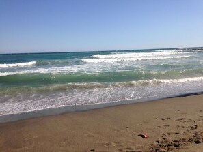 On the beach, beach towels