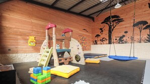A play area with a climbing structure, soft play mats, and a wall mural. - House / Villa - St rémy le petit (Saint-Remy-Le-Petit)