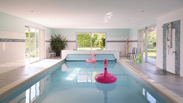 A swimming pool with a view of a garden, a chair, and a potted plant. - House / Villa - St rémy le petit (Saint-Remy-Le-Petit)