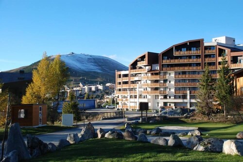 Logement tout confort, au pied des pistes, exposition sud, commerces, calme 