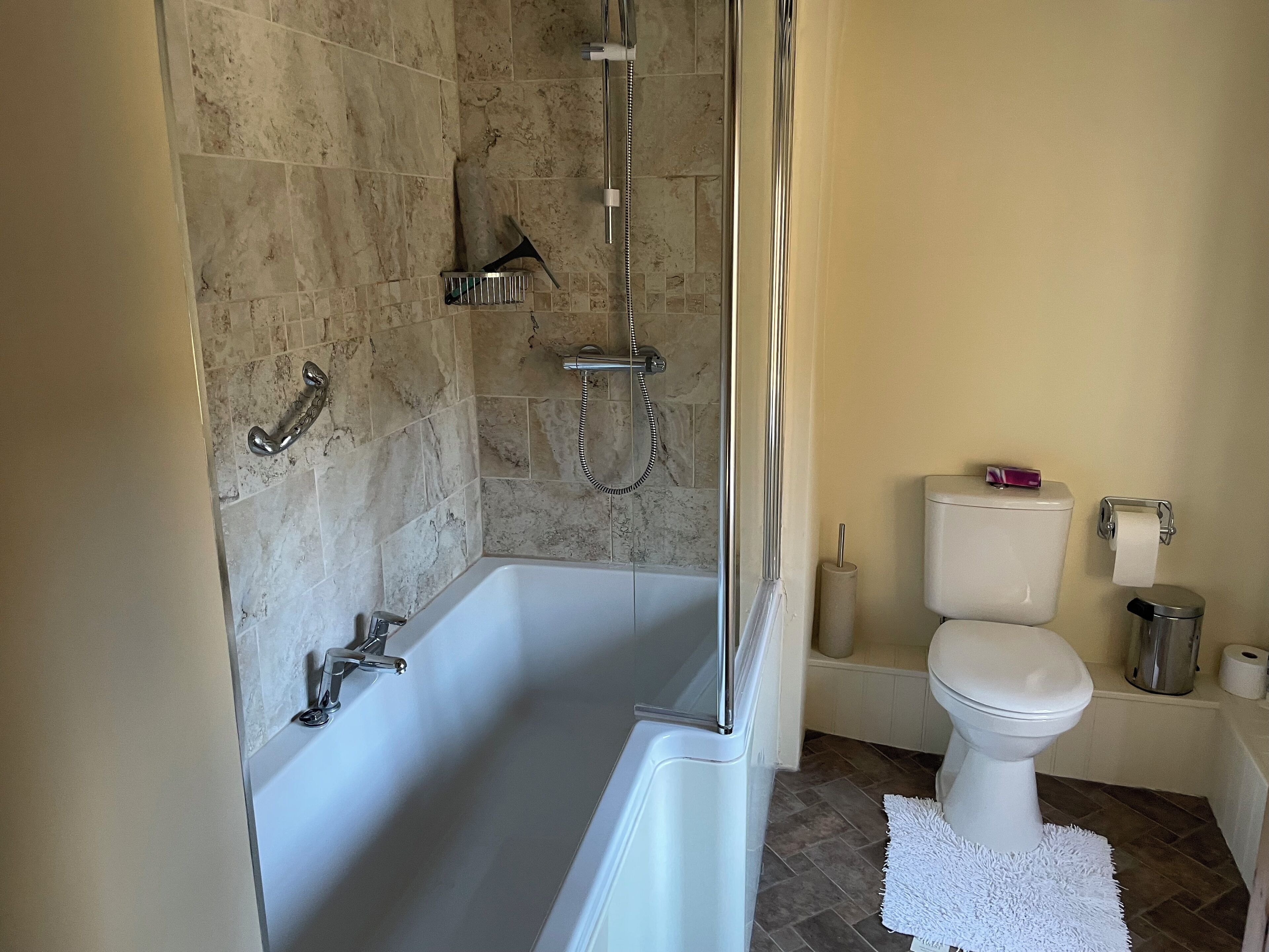 Combined shower/tub, hair dryer, towels, soap