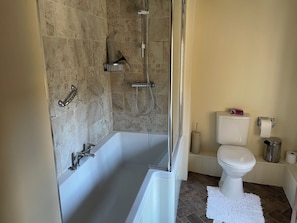 Combined shower/tub, hair dryer, towels, soap