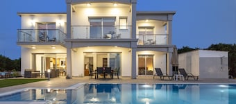 Villa Ammoyiali on the Beach -  a large modern villa that sleeps 8 guests in 4 bedrooms