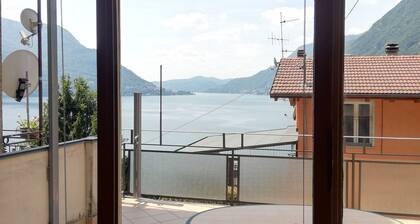 Spacious bright apartment with lake view terrace and private parking space