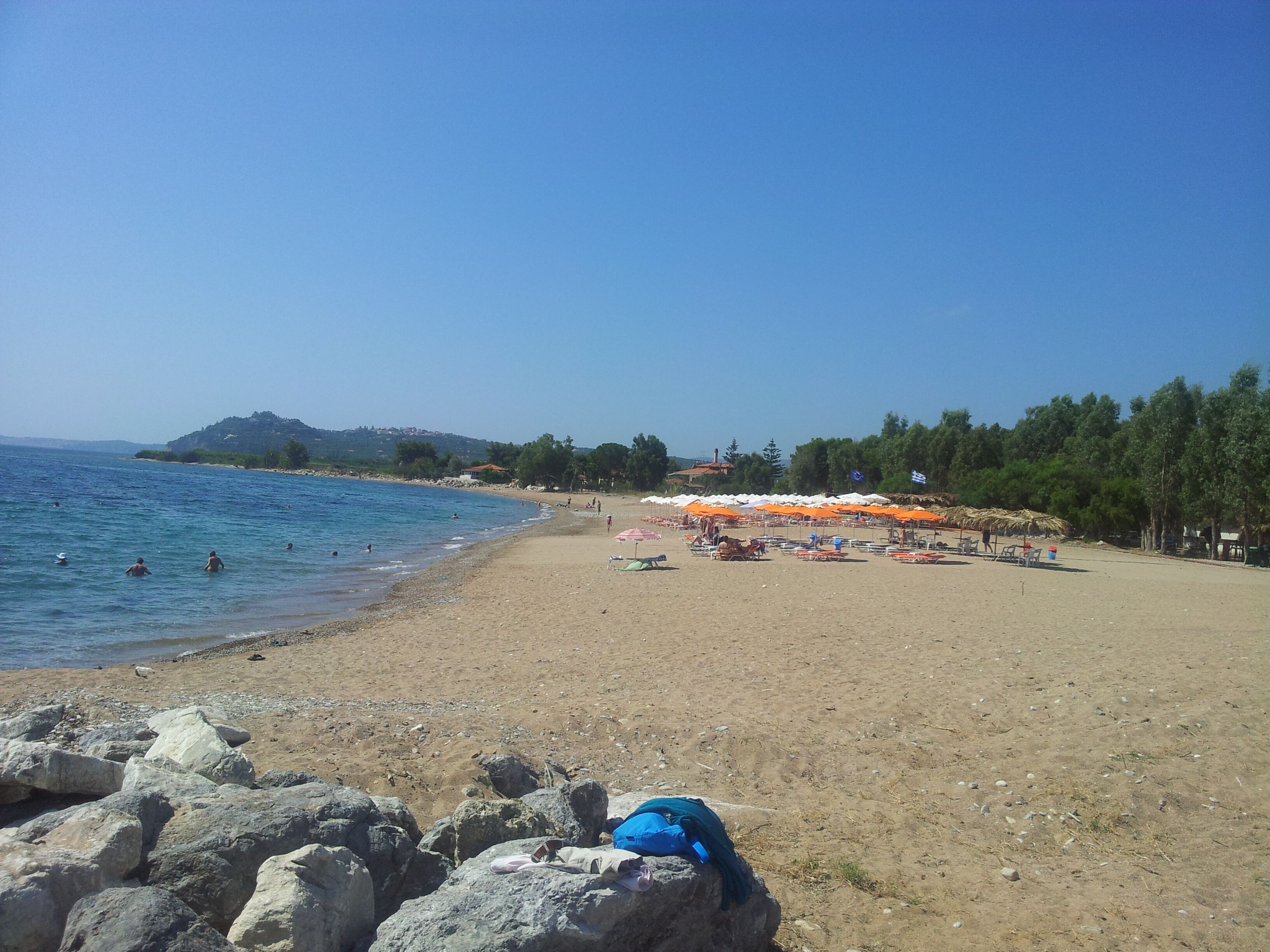 On the beach, sun loungers, beach towels