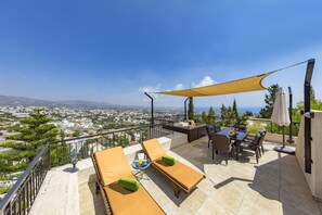 Outdoor dining - Executive Holiday Villa with Private Pool, Roof Terrace and Amazing Views in Peyia (Zalatzion)