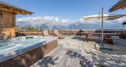 Magnifique chalet pour 12 personnes au coeur des Alpes suisses avec bain Ă remous