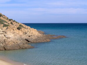 Beach nearby - Seaside villa with garden and panoramic mountain views. (chia)