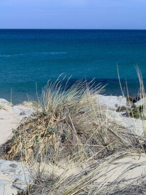Beach nearby - Seaside villa with garden and panoramic mountain views. (chia)