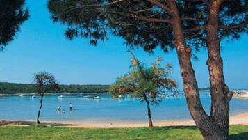 Beach nearby, sun loungers
