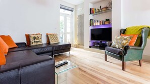 Télévision, lecteur de DVD, vidéothèque