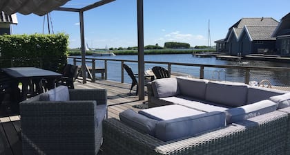 Luxury holiday home on the Sneekermeer in Sneek, Friesland