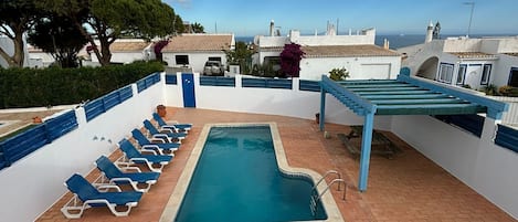 Outdoor pool, sun loungers