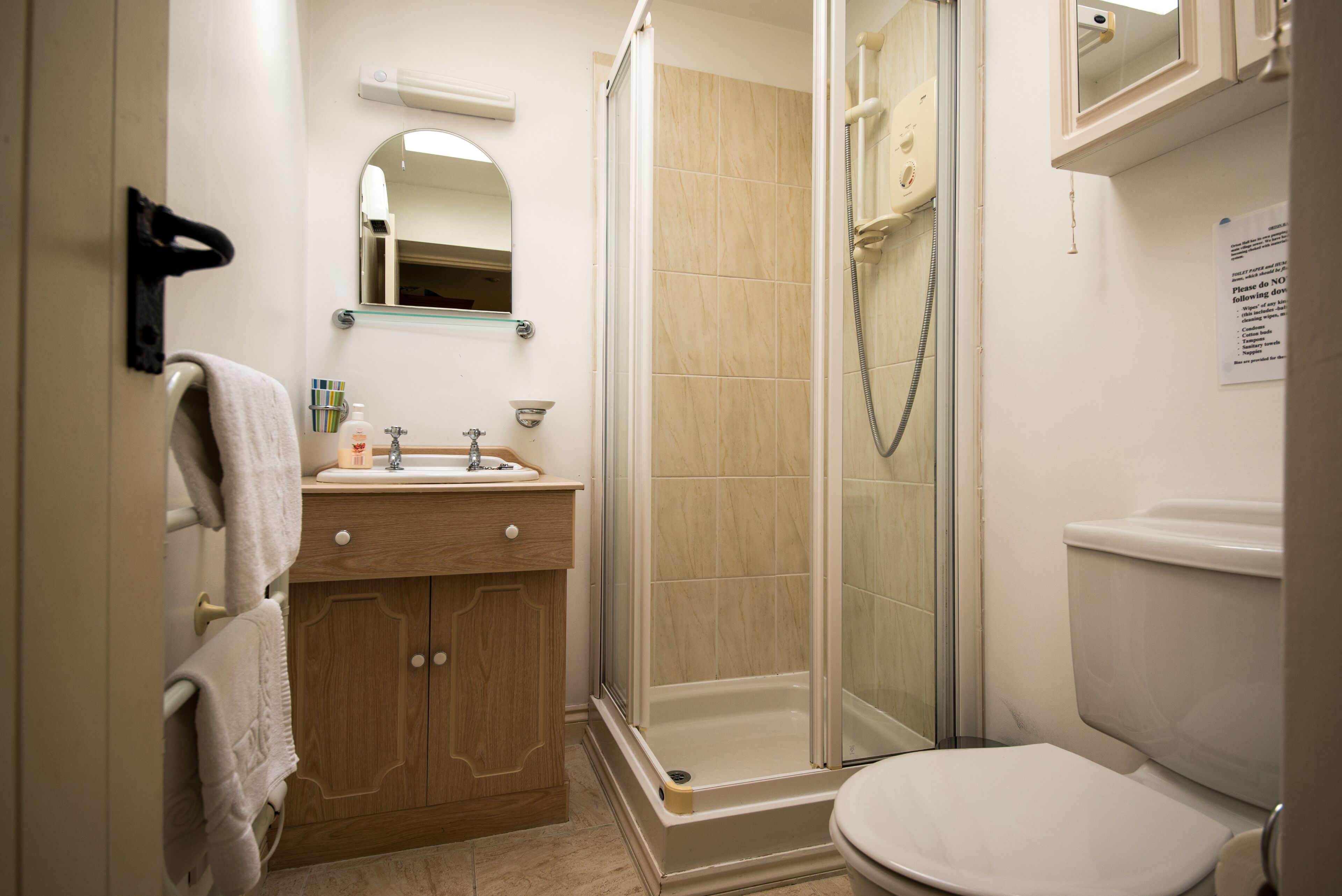 Combined shower/tub, hair dryer, towels, soap