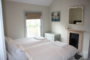 4 bedrooms, iron/ironing board, travel cot, WiFi