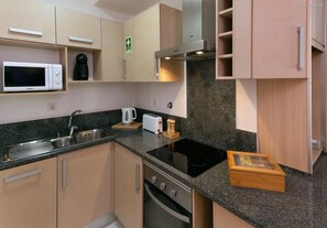 Fridge, microwave, oven, stovetop - A24 - LuzBay Beach Apartment (Luz)
