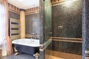Combined shower/tub, hair dryer, towels, soap