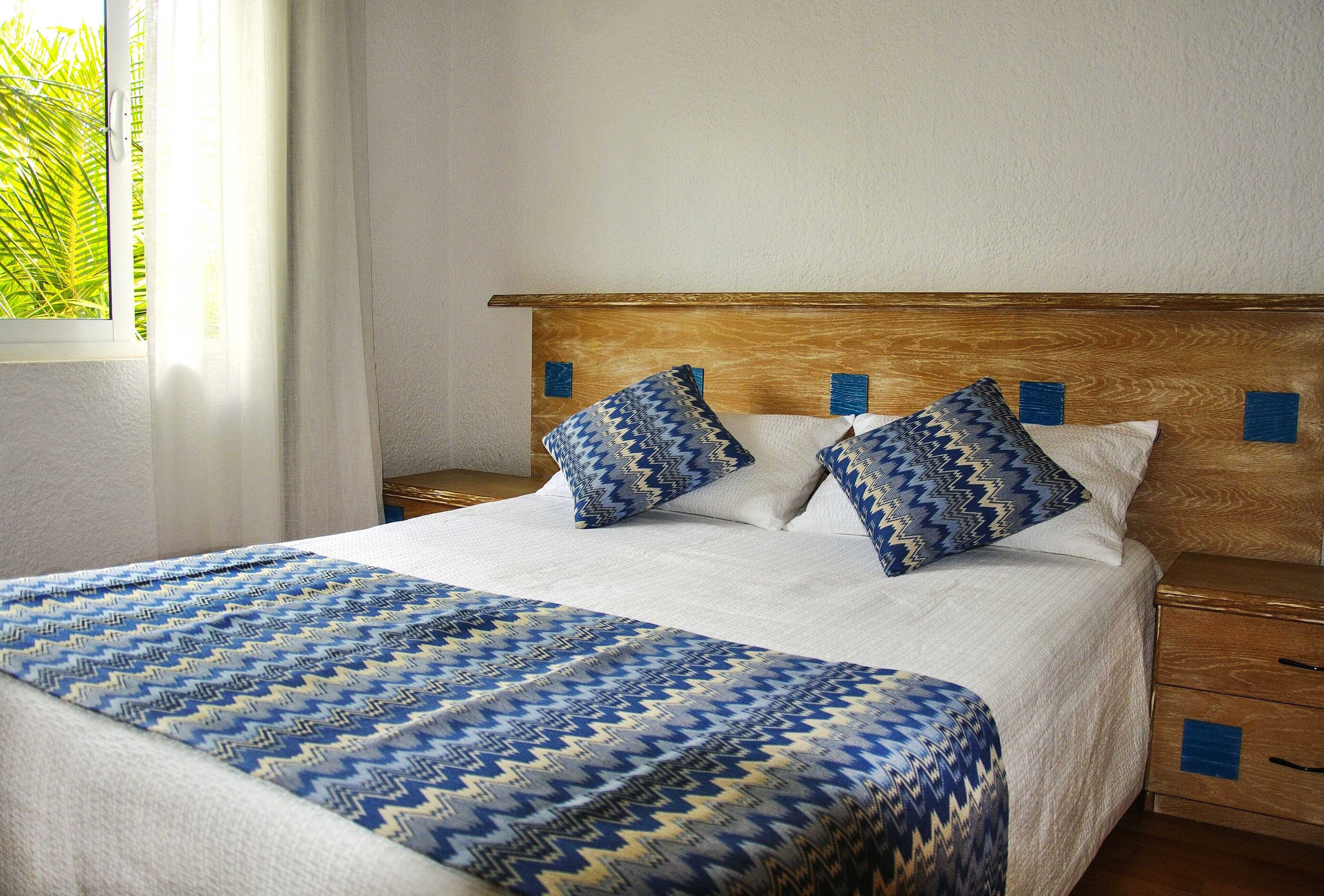 2 bedrooms, in-room safe, iron/ironing board, travel cot