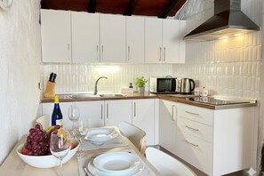 Coffee/tea maker, fridge, microwave, toaster