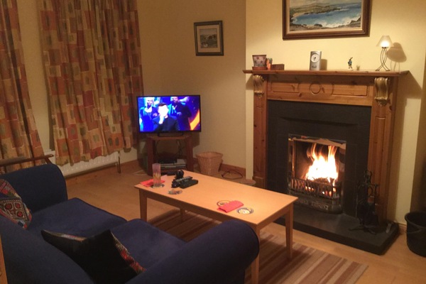 Separate lounge, open fire, flat screen TV with satellite channels