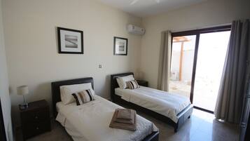 3 Schlafzimmer, Zimmersafe, BĂŒgeleisen/BĂŒgelbrett, Reisekinderbett