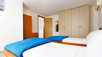 3 dormitorios, tabla de planchar con plancha, wifi gratis y ropa de cama