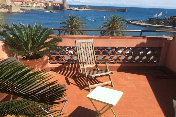 Terrasse et vue panoramique sur baie