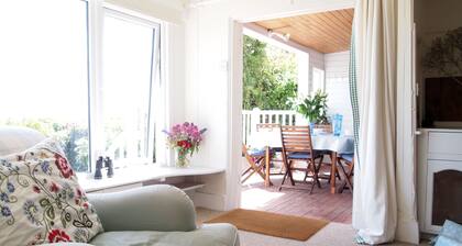 Beach front location, Pet friendly, Full of charachter, Private garden, Sea view
