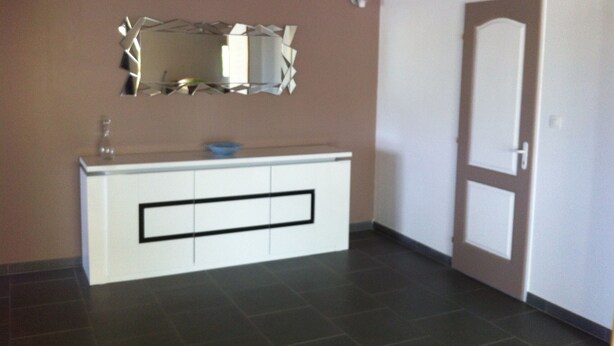 A bathroom with a white vanity, a mirror, and a door. - renting a beautiful villa in the moors (Lahosse)