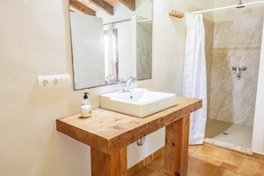 Combined shower/tub, hair dryer, towels, toilet paper