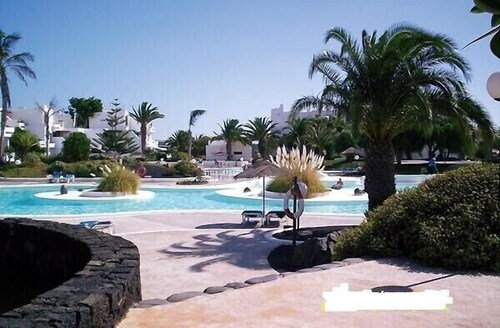 Holiday apartment in a private complex with beautiful pools and gardens