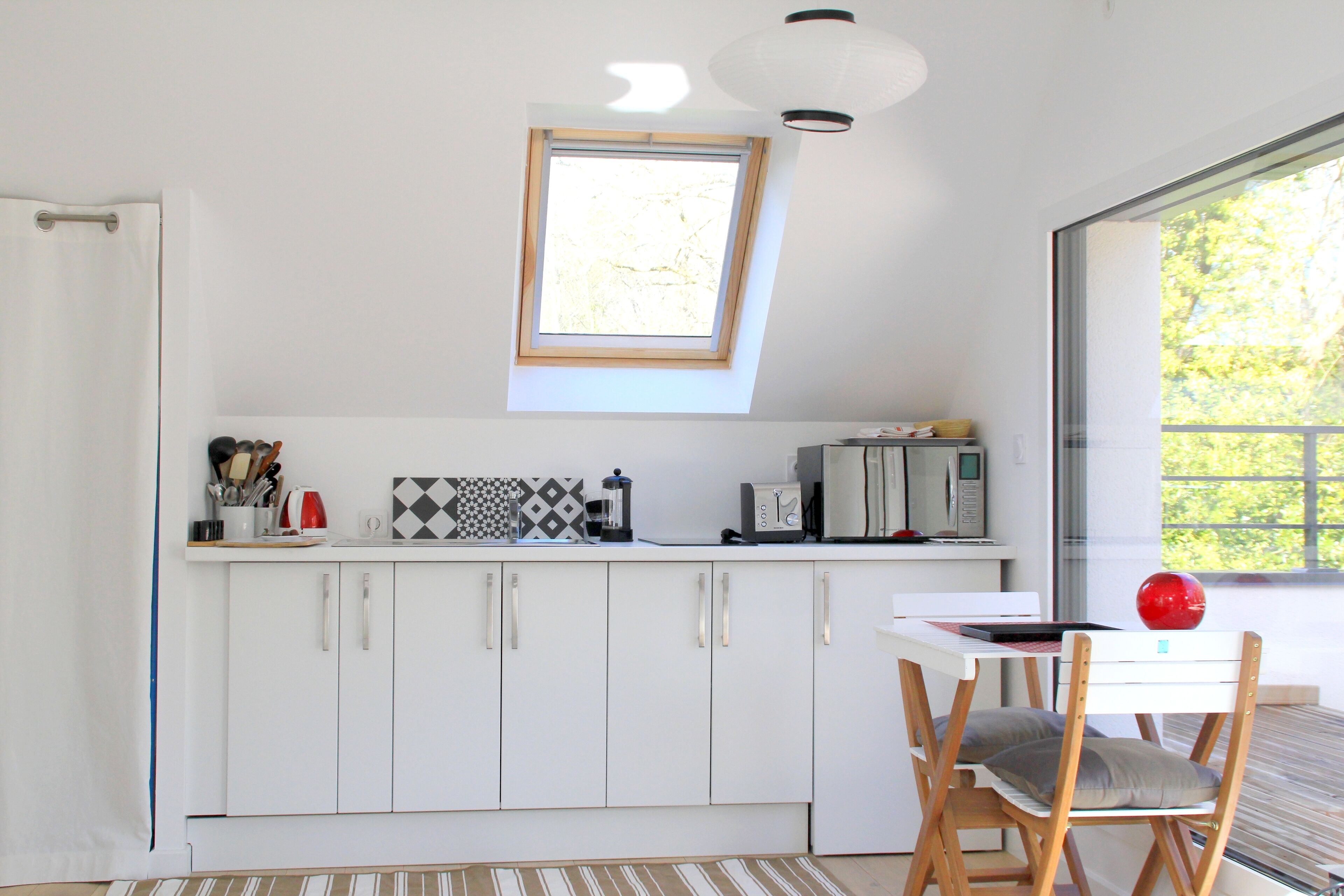  In a green setting close to the ocean 