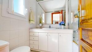 Hair dryer, towels, soap, toilet paper
