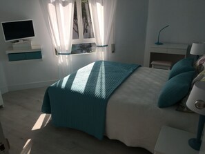 2 habitaciones, tabla de planchar con plancha y wifi gratis 