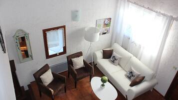 TV, fireplace, books, offices